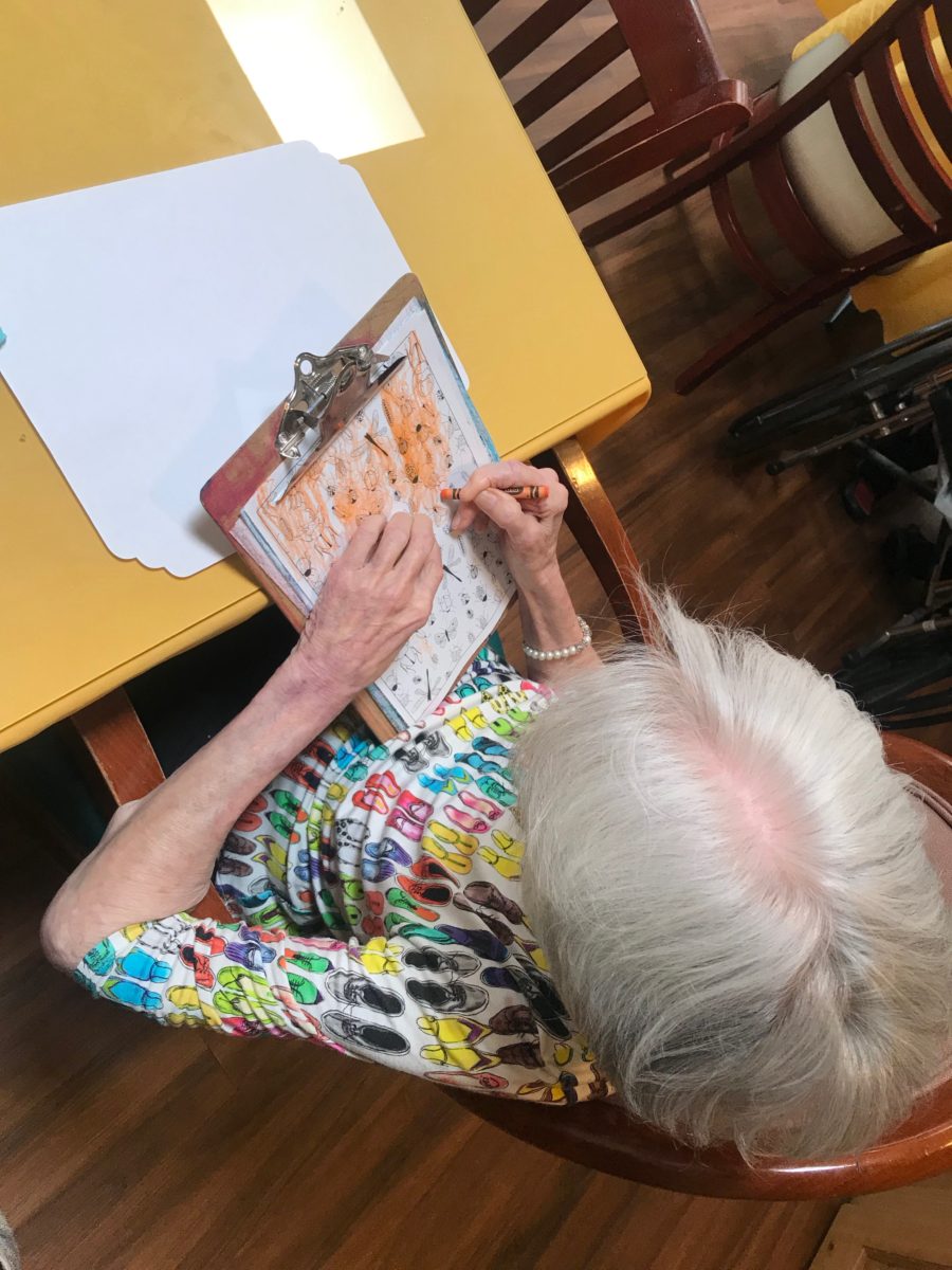 Kay loves coloring during free time